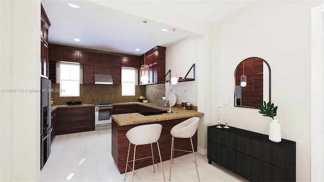 kitchen with sink, tasteful backsplash, white range, kitchen peninsula, and decorative light fixtures