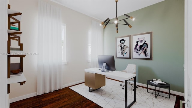 office space with light hardwood / wood-style floors and an inviting chandelier