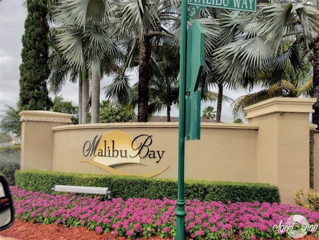 view of community sign