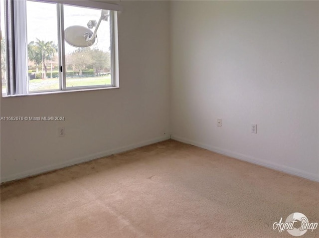 view of carpeted spare room