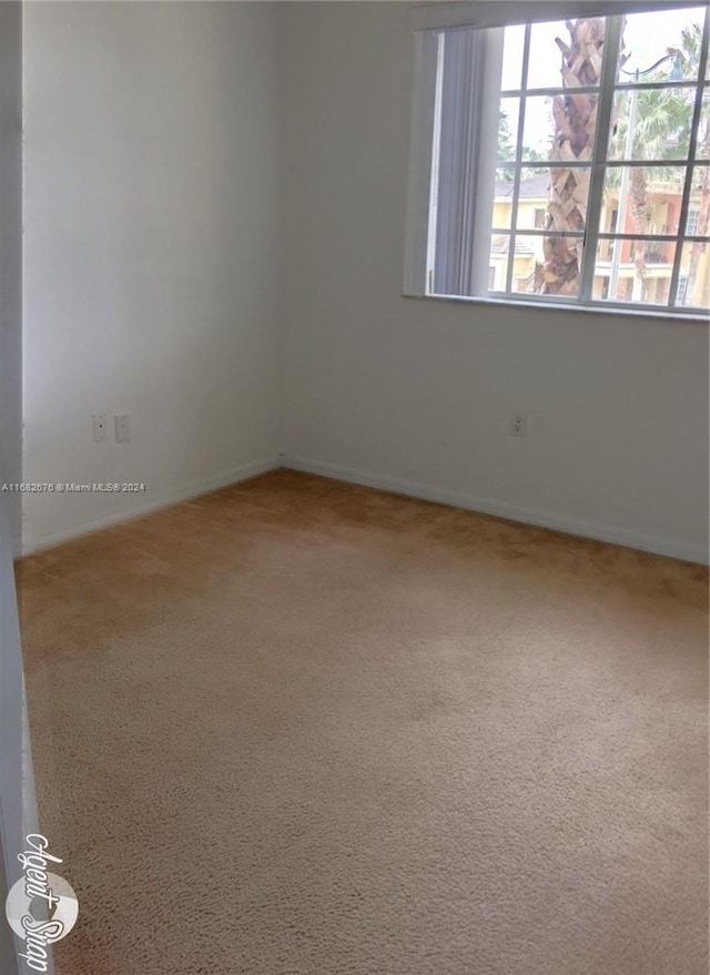 view of carpeted spare room