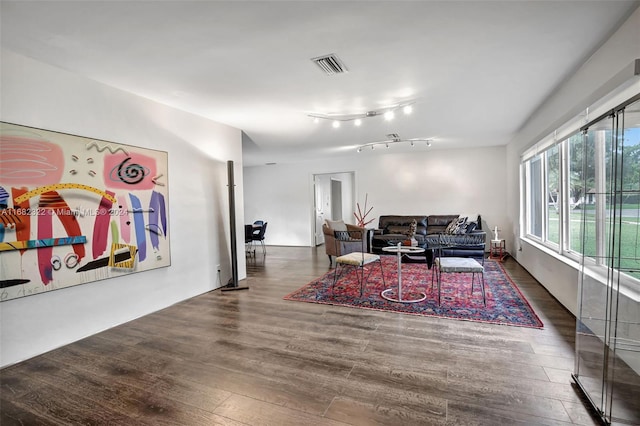 living room with dark hardwood / wood-style floors