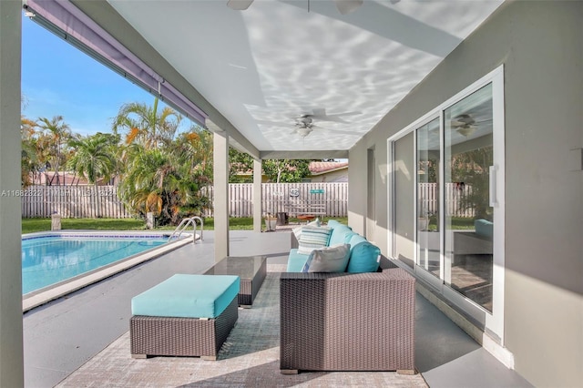 view of patio featuring a fenced in pool, an outdoor hangout area, and ceiling fan