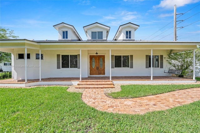 view of front facade featuring a front yard and a porch