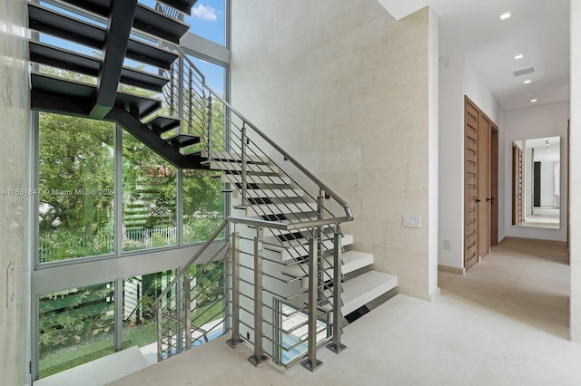 stairs with concrete floors