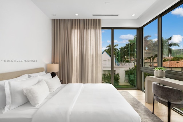 bedroom with light wood-type flooring