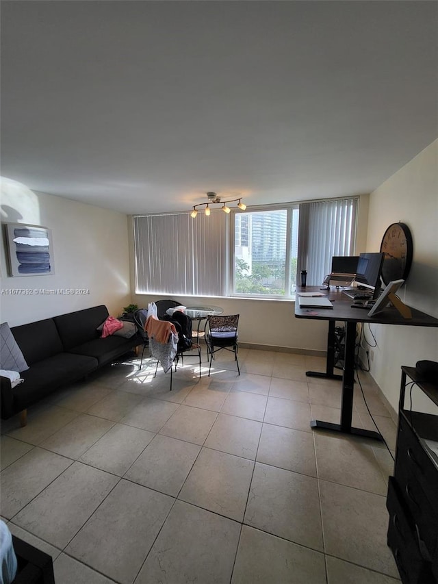 living room with light tile patterned flooring