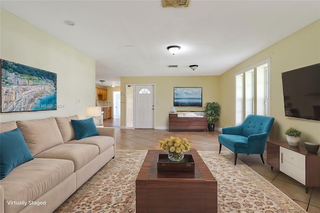 living room featuring light tile patterned floors