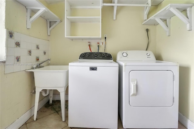 laundry area with separate washer and dryer