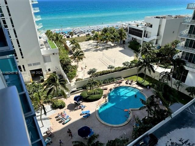 aerial view with a view of the beach and a water view