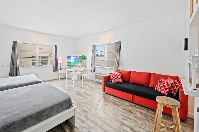 bedroom featuring hardwood / wood-style floors