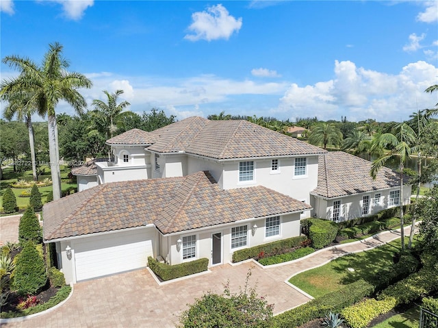 view of front of home with a garage