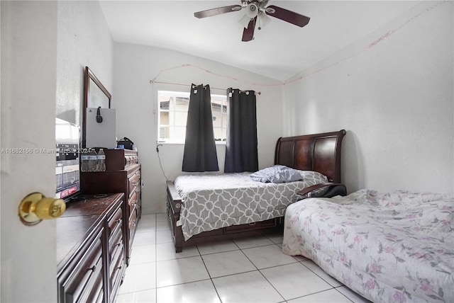 bedroom featuring vaulted ceiling, light tile patterned flooring, and ceiling fan