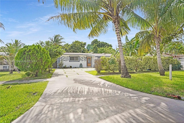 view of front of home with a front lawn