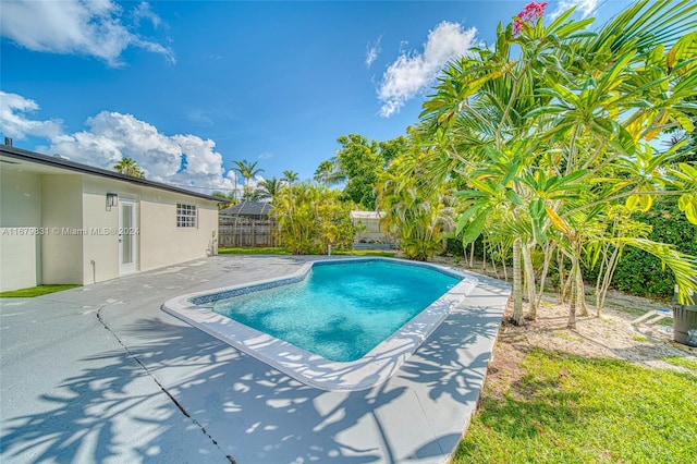 view of swimming pool featuring a patio