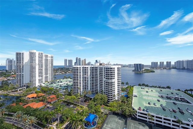 birds eye view of property with a water view