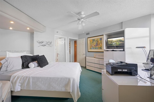 bedroom featuring ceiling fan, a textured ceiling, and carpet floors