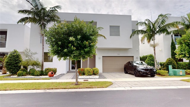 view of front of property featuring a garage