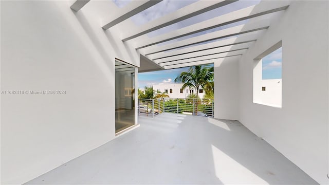 view of patio with a balcony