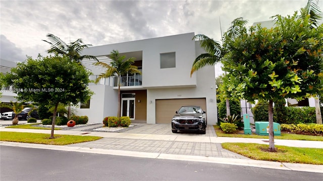 view of front of home with a garage