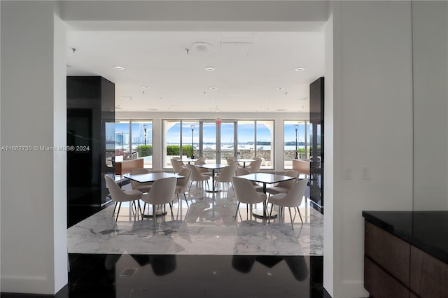 dining area with a wealth of natural light