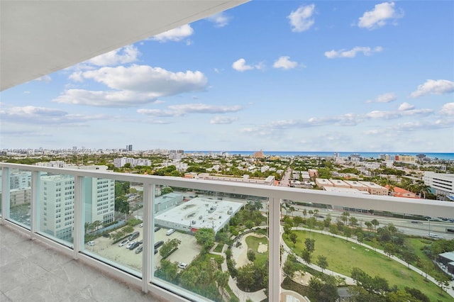 balcony featuring a water view