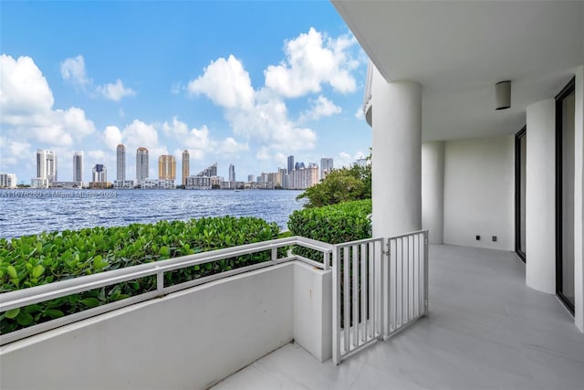 balcony featuring a water view