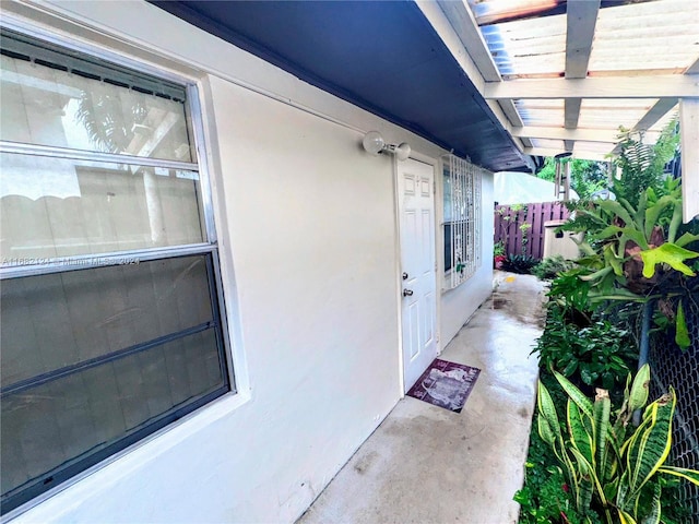 62 NW 73rd Pl, Miami, FL 33126 - property entrance with stucco siding