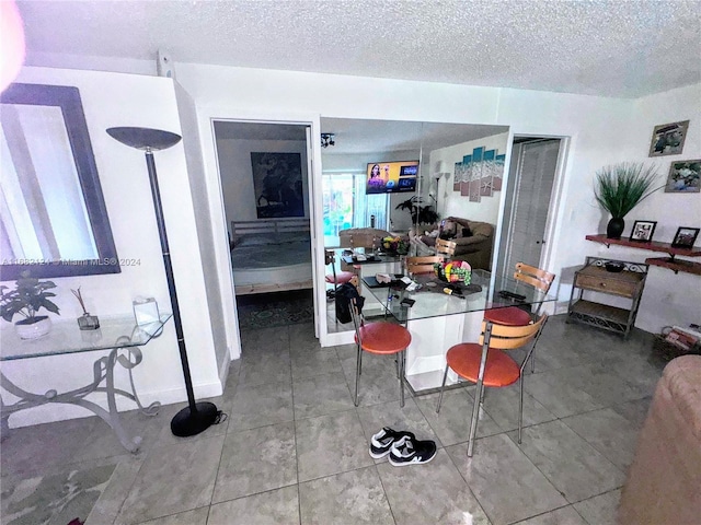 62 NW 73rd Pl, Miami, FL 33126 - dining space with a textured ceiling