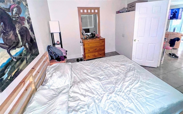 62 NW 73rd Pl, Miami, FL 33126 - bedroom featuring baseboards