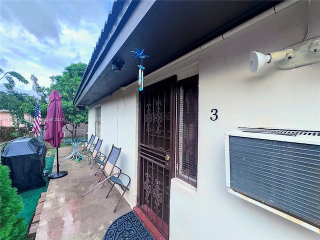 view of patio with a grill