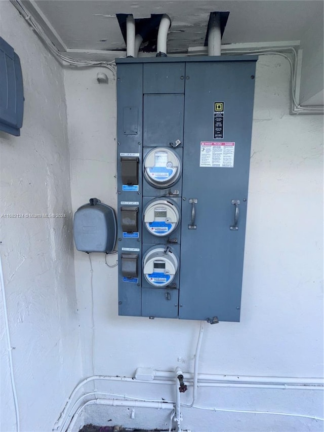 62 NW 73rd Pl, Miami, FL 33126 - utility room featuring electric meter