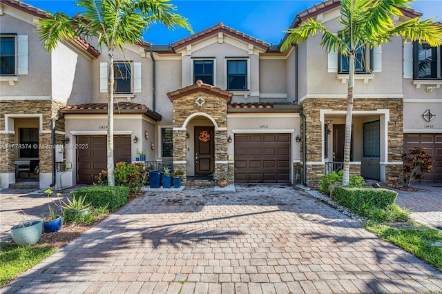 view of front of property with a garage