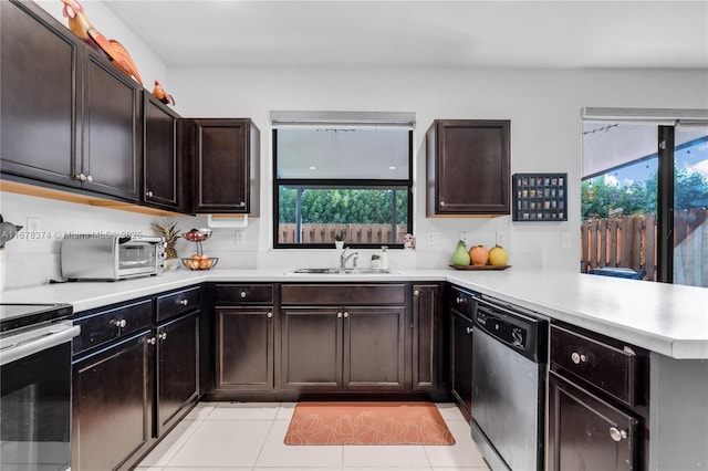 kitchen featuring kitchen peninsula, appliances with stainless steel finishes, dark brown cabinets, sink, and light tile patterned flooring