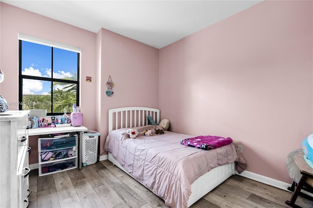 bedroom featuring light hardwood / wood-style flooring