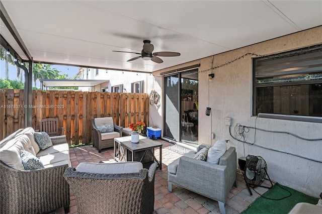 view of patio featuring outdoor lounge area and ceiling fan