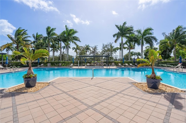 view of swimming pool with a patio area