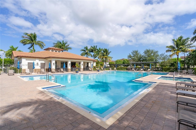 view of pool featuring a patio area