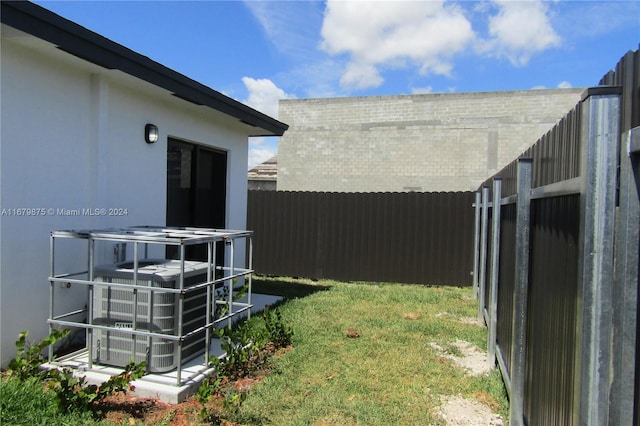 view of yard featuring central AC