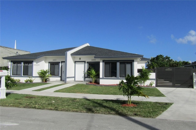 view of front of property with a front lawn