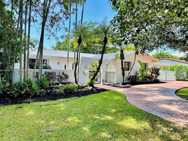 view of side of property featuring a yard