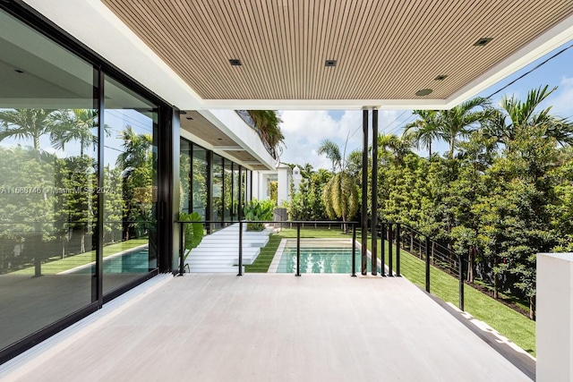 view of patio / terrace featuring a fenced in pool