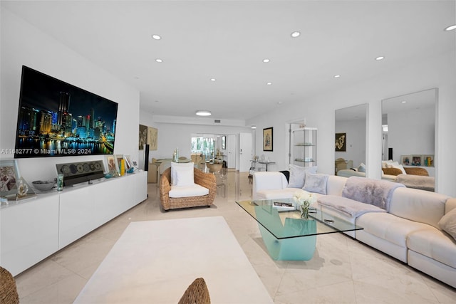 living room with light tile patterned flooring