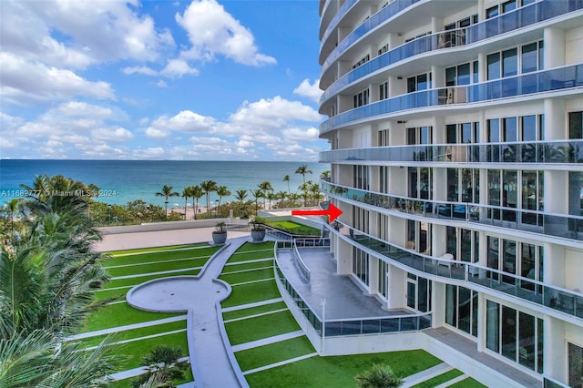 balcony featuring a water view