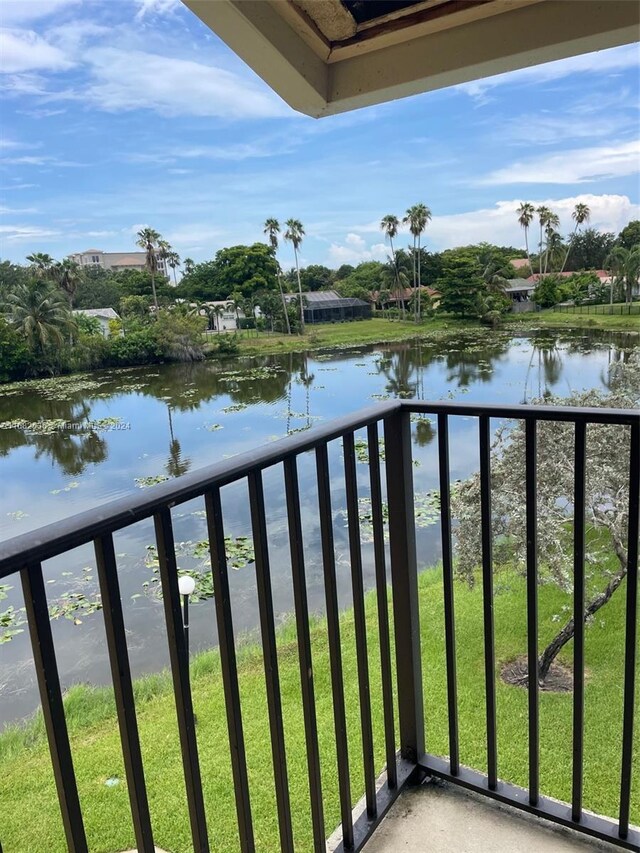 11453 NW 39th Ct Unit 308-2, Coral Springs, FL 33065 - balcony featuring a water view
