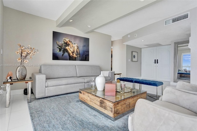 living room with tile patterned flooring