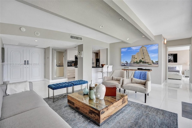 living room with light tile patterned flooring