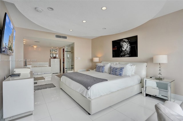 bedroom featuring light tile patterned floors