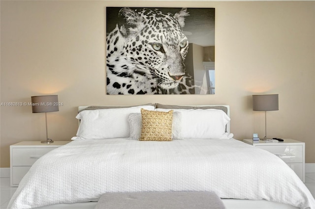 bedroom featuring tile patterned flooring