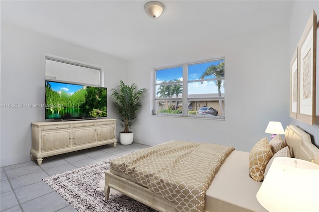 bedroom featuring light tile patterned flooring